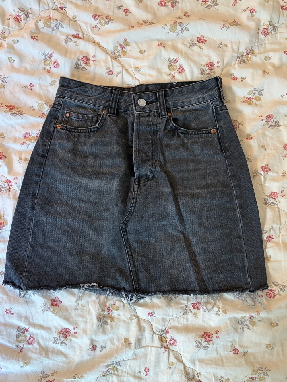 High-Rise Black Denim Mini Skirt with Raw Hem